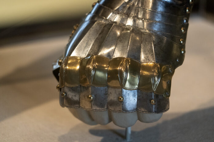 Image is for illustration purposes only: Medieval armor iron glove