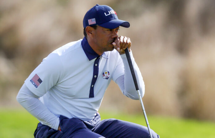 Tiger Woods of USA lines up a putt at Ryder Cup 2018